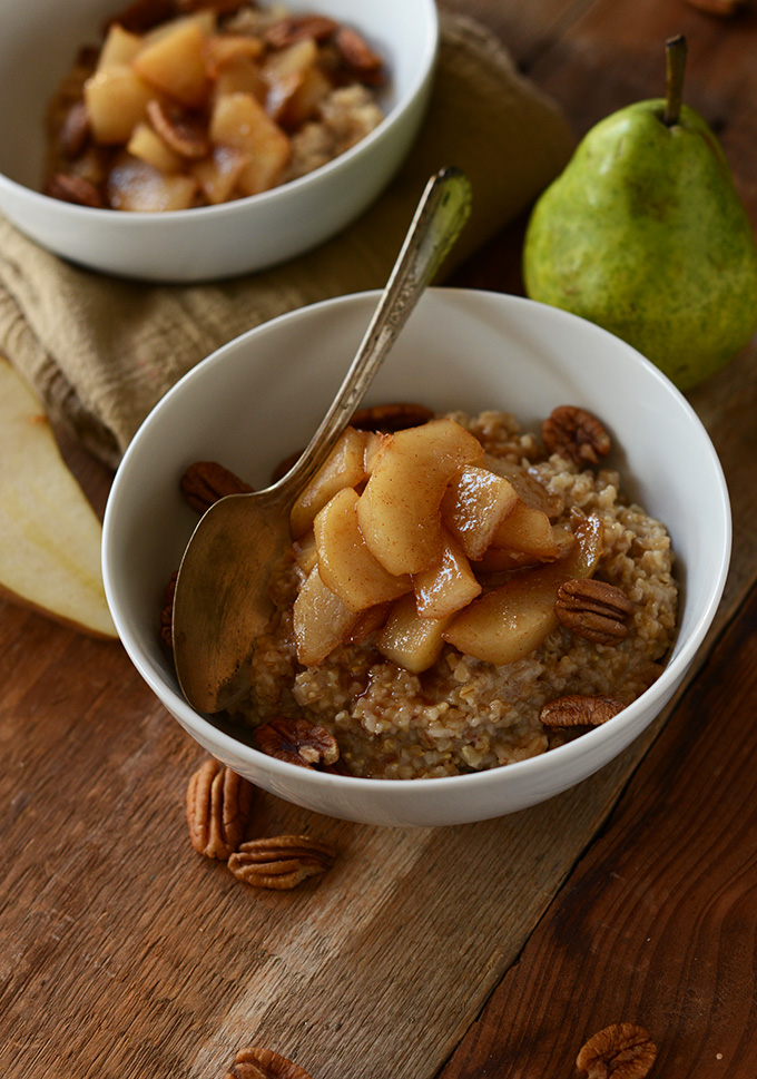 Two bowls of Vegan Brown Sugar Pear Oats with pecans